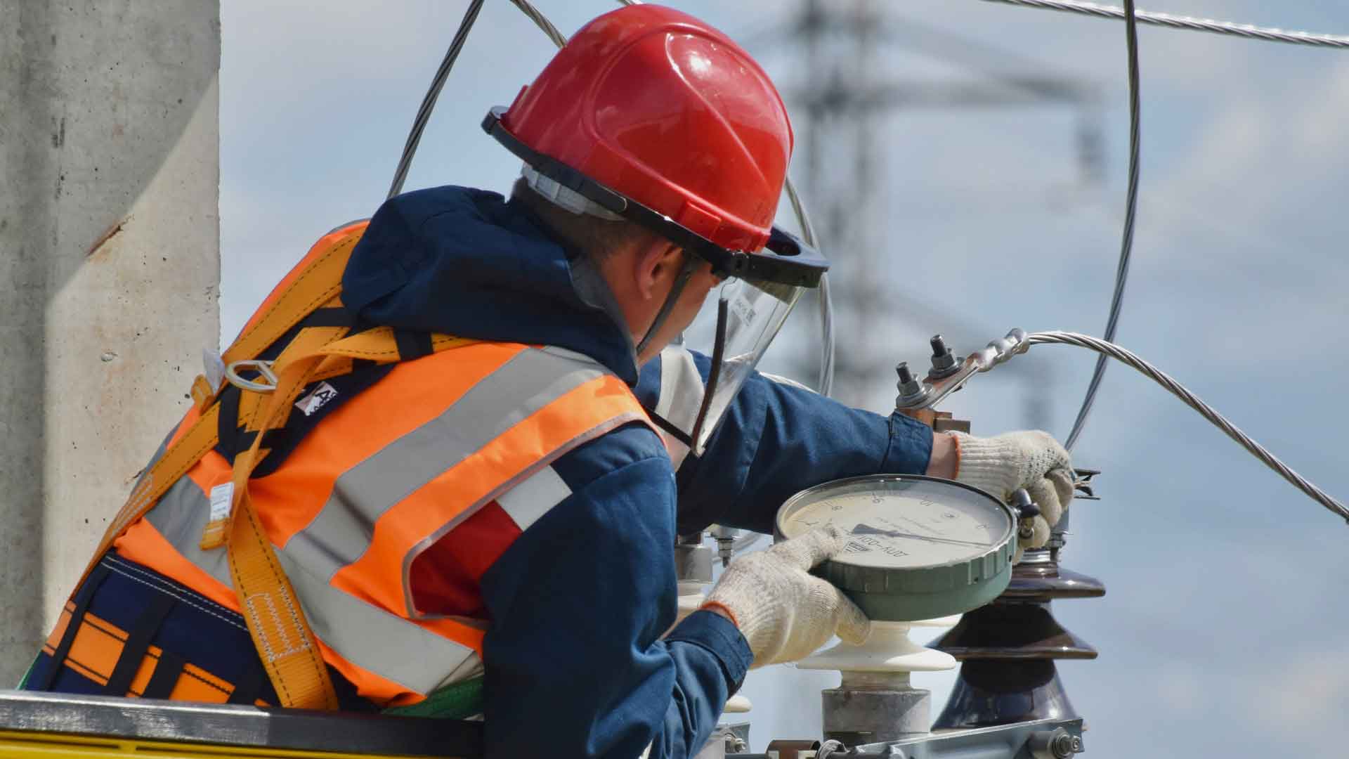 Technician checking a heating and cooling system